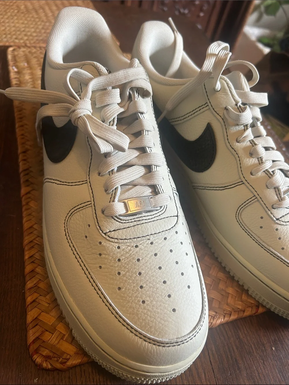 Nike Air One Men’s Low-Top Sneakers in Cream with Black Swoosh